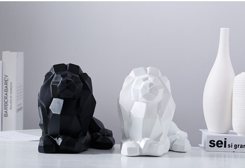 Statuette lion couché