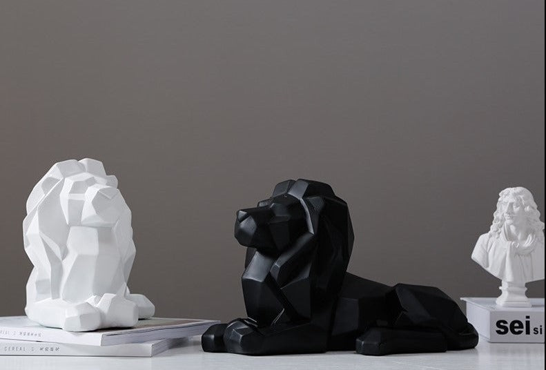 Statuette lion couché