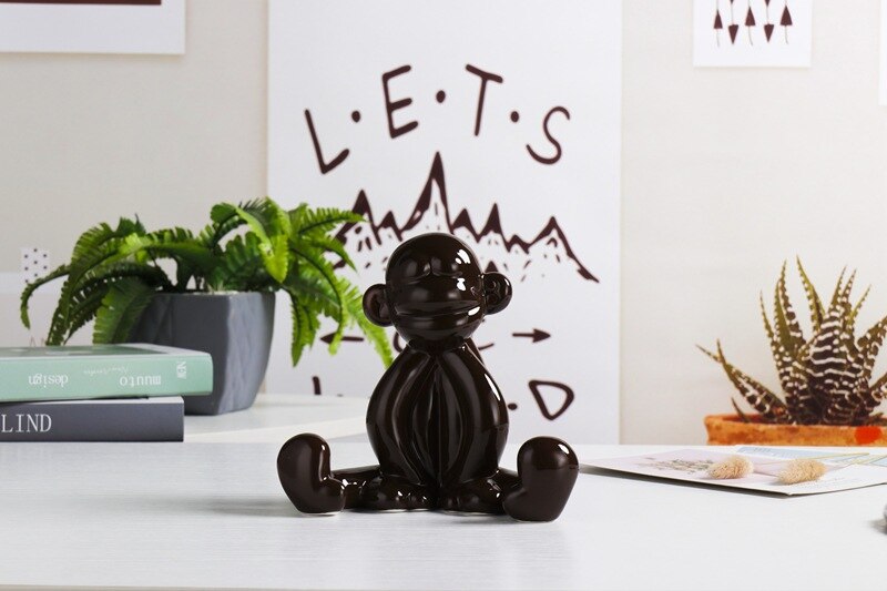 Statuette singe souriant en ballon de baudruche