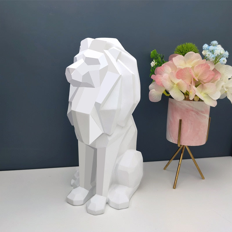 Statuette lion assis