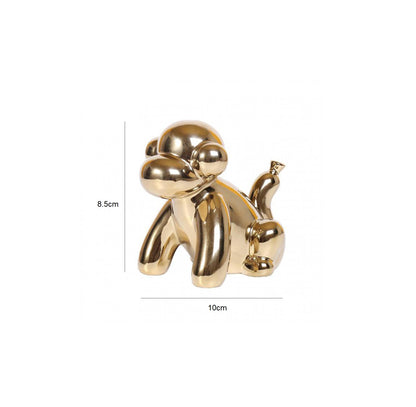 Statuette singe doré en ballon de baudruche